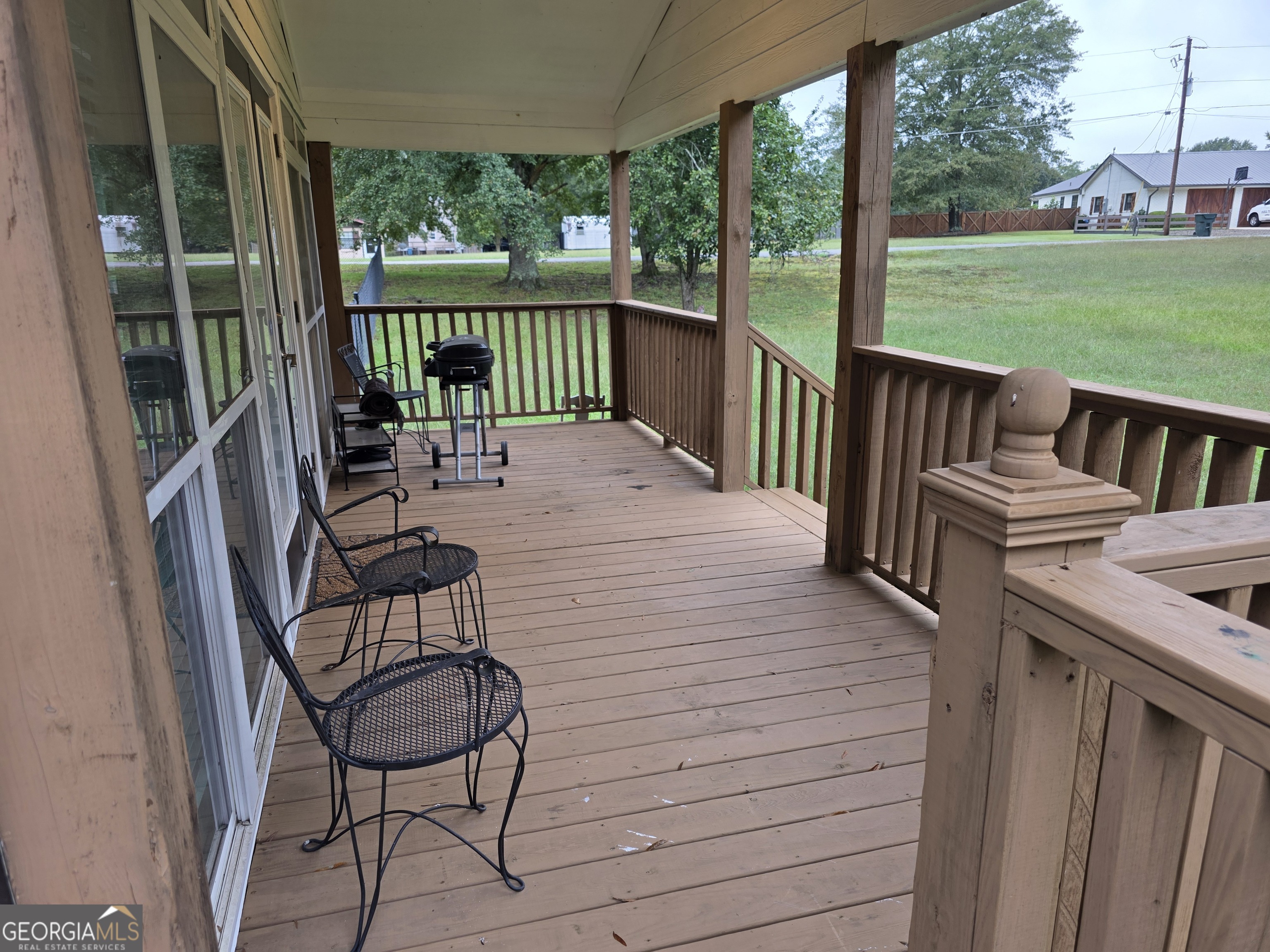391 Price Street Statham, GA 30666 - Photo 41 of 41 a view of a chairs and tables in the balcony