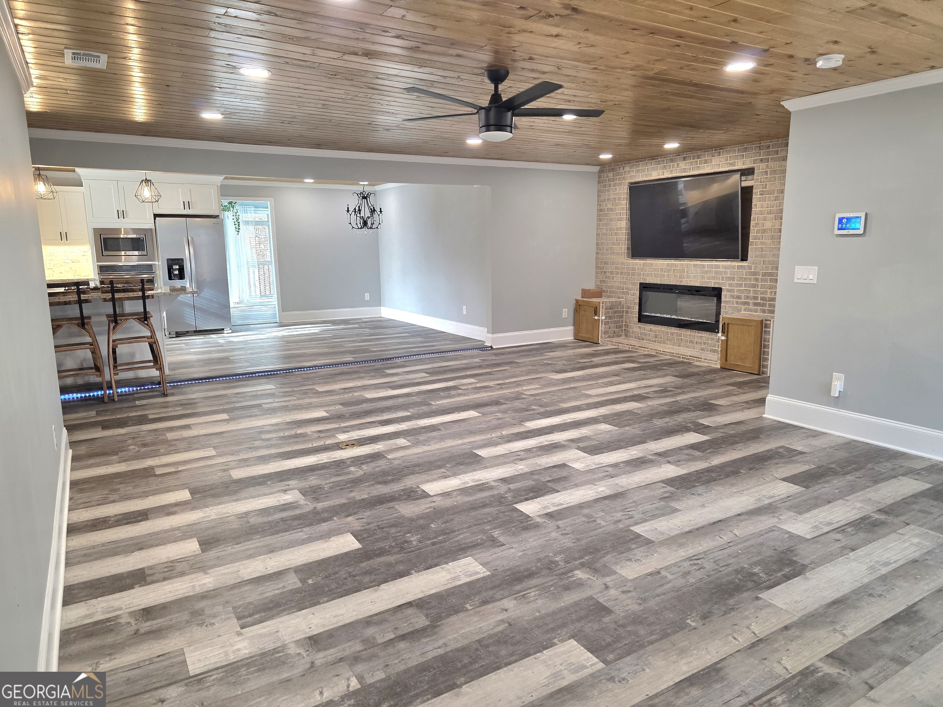 391 Price Street Statham, GA 30666 - Photo 10 of 41 a view of a livingroom with a flat screen tv