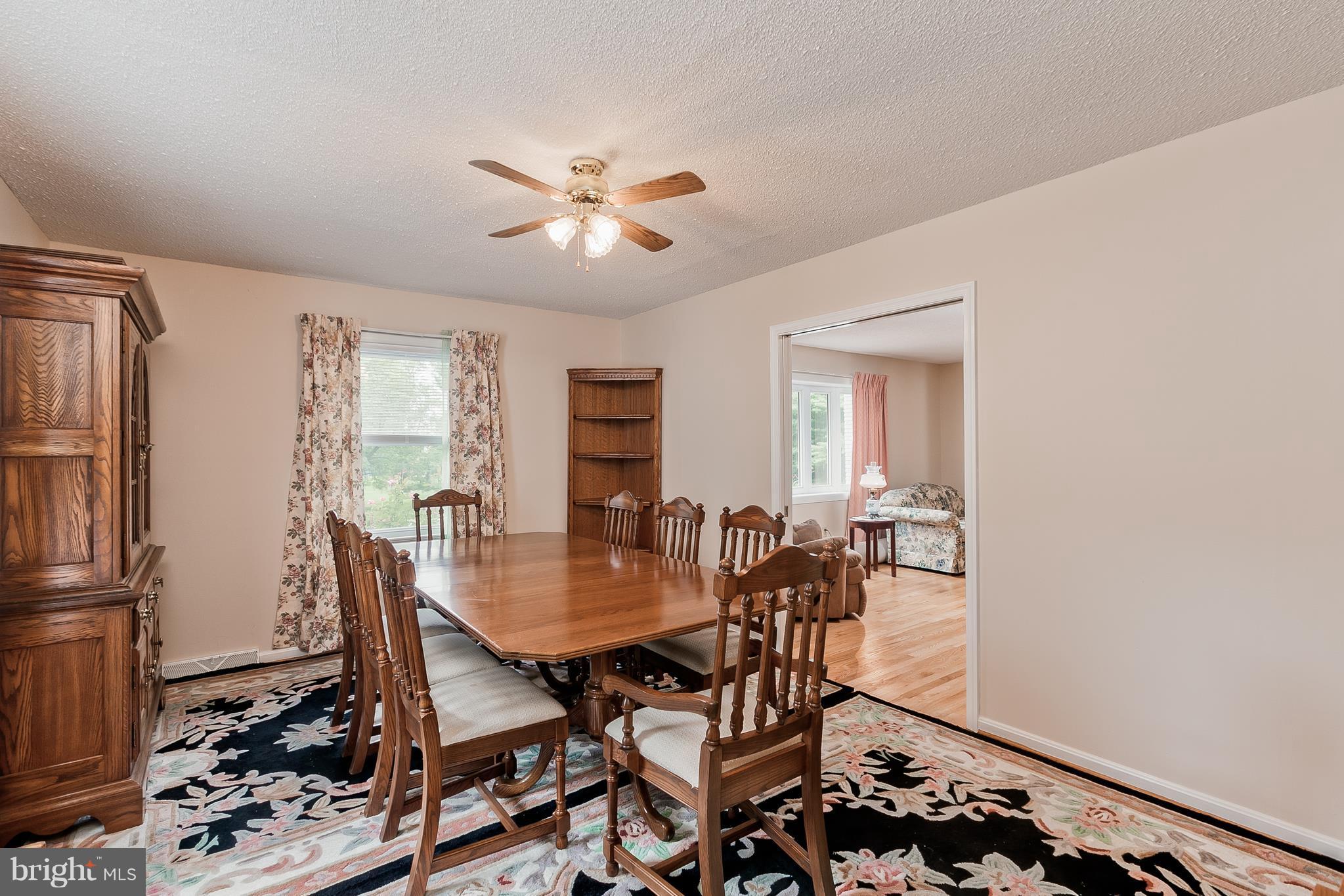18533 Wagaman Road Hagerstown, MD 21740 - Photo 15 of 30 Spacious Dining Room w/ Oak Hardwood Under Rug