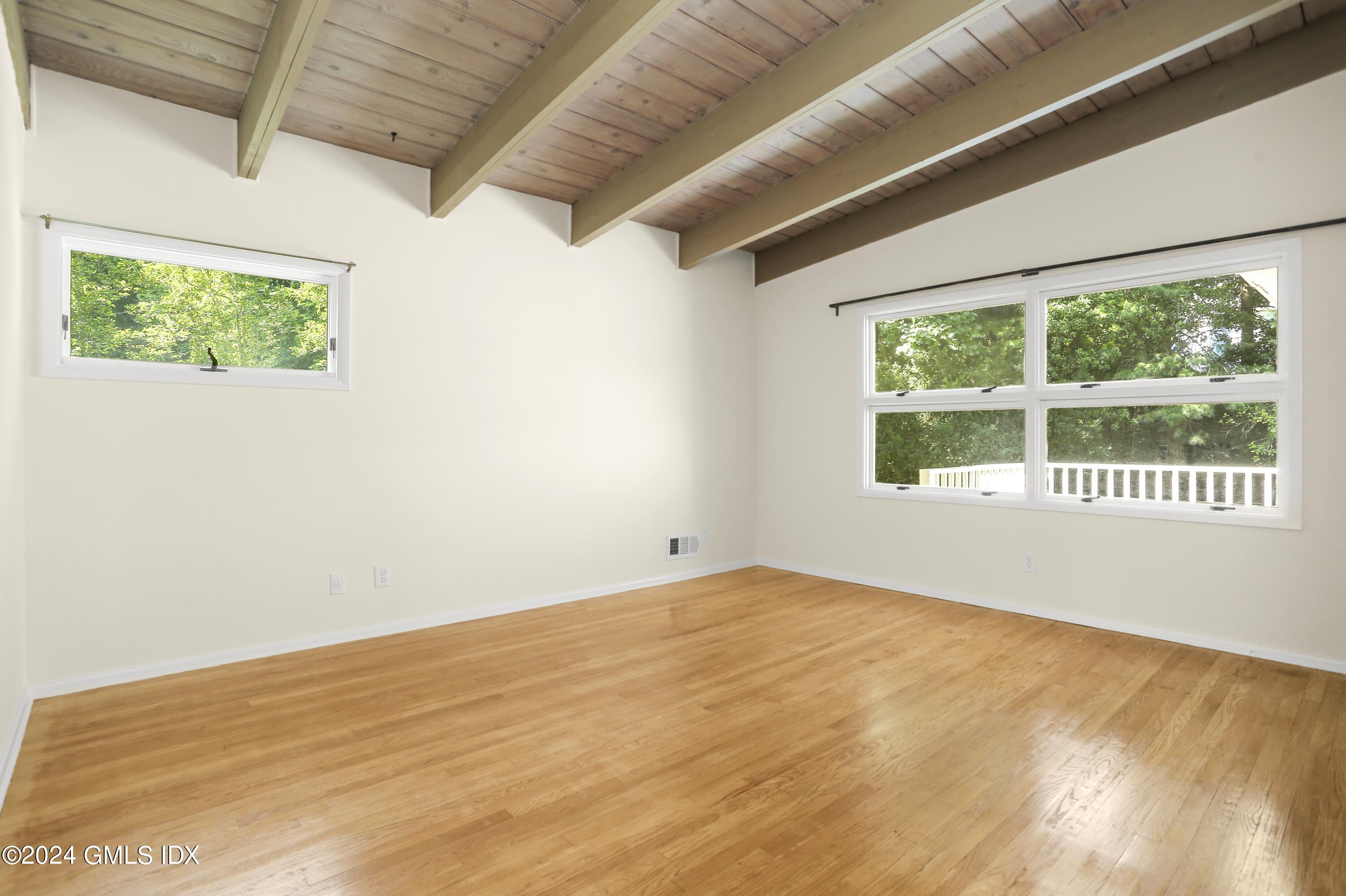 66 Arch Street Riverside, CT 06878 - Photo 14 of 30 a view of an empty room with a window