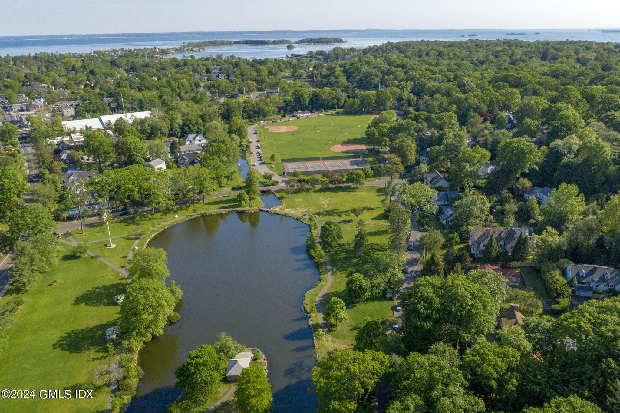 66 Arch Street Riverside, CT 06878 - Photo 24 of 30 a view of a lake with a city