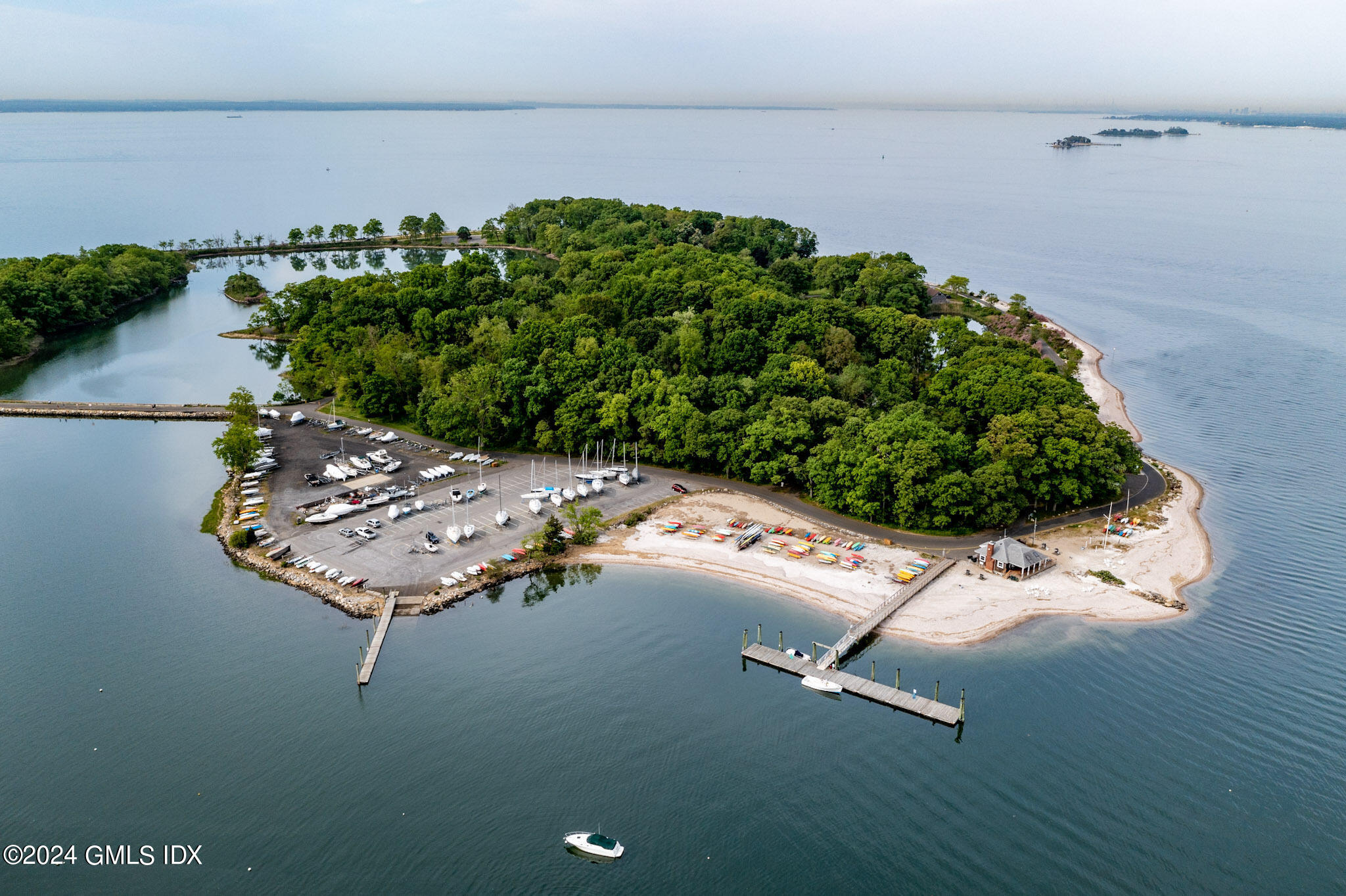 66 Arch Street Riverside, CT 06878 - Photo 27 of 30 a picture of a table and chairs in the patio