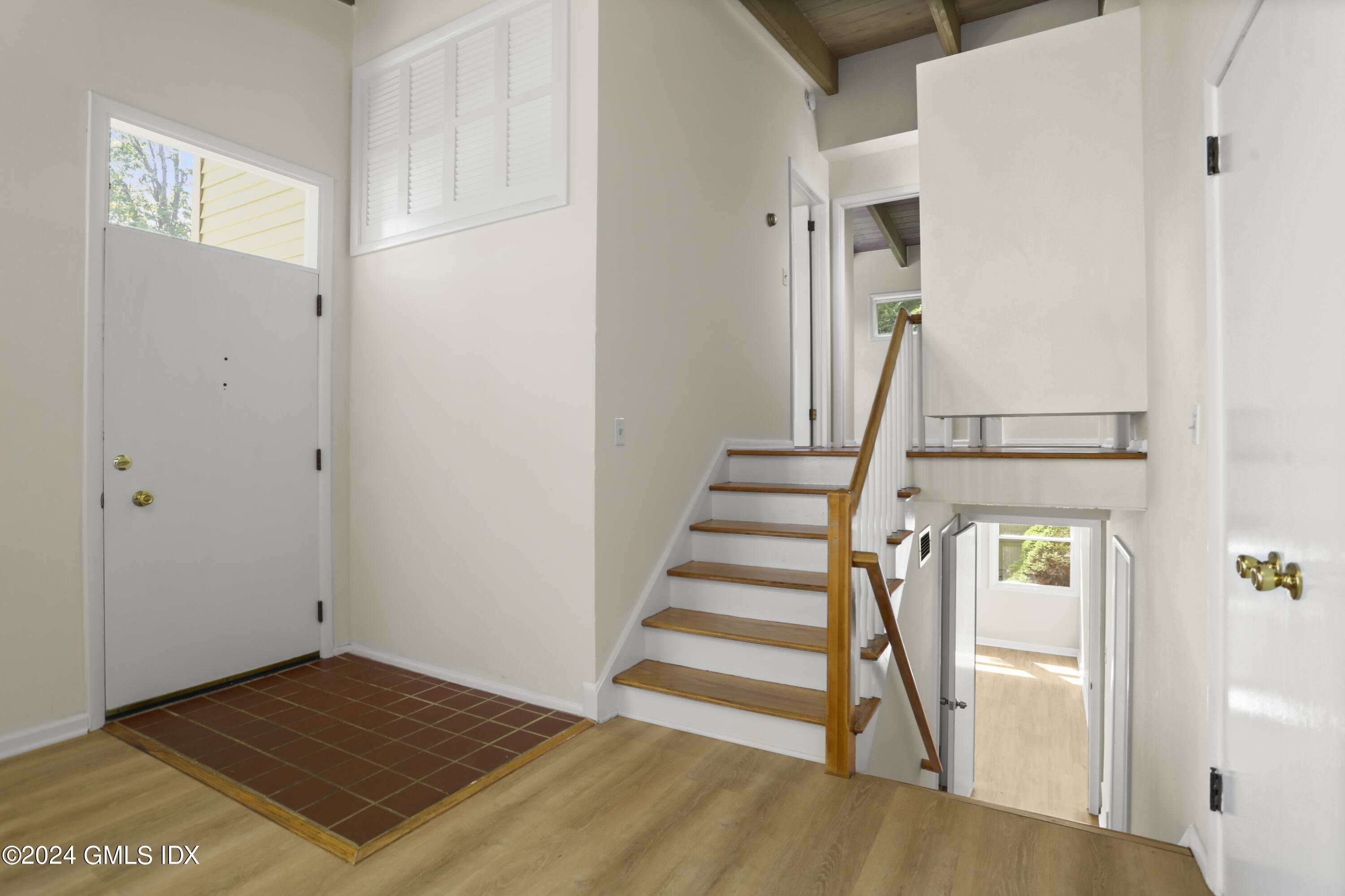 66 Arch Street Riverside, CT 06878 - Photo 4 of 30 a view of entryway and hall with wooden floor