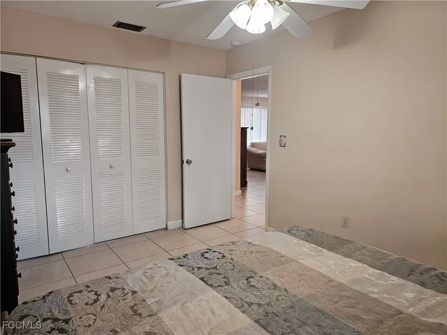 an empty room with a bed