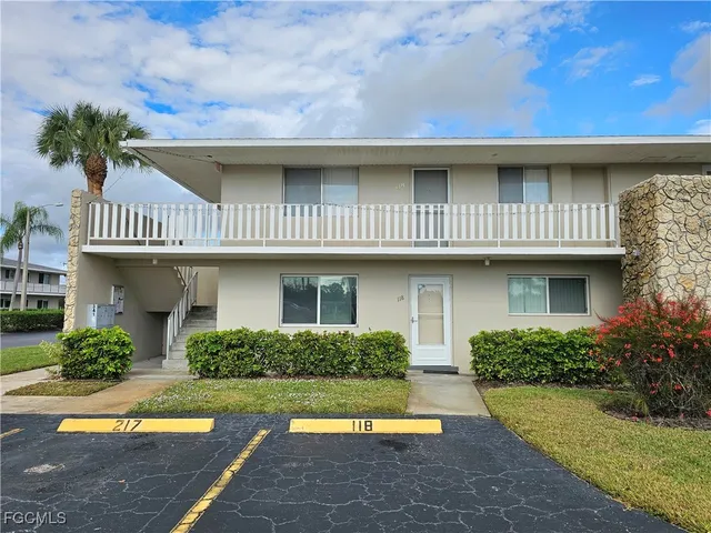 a front view of a house with swimming pool