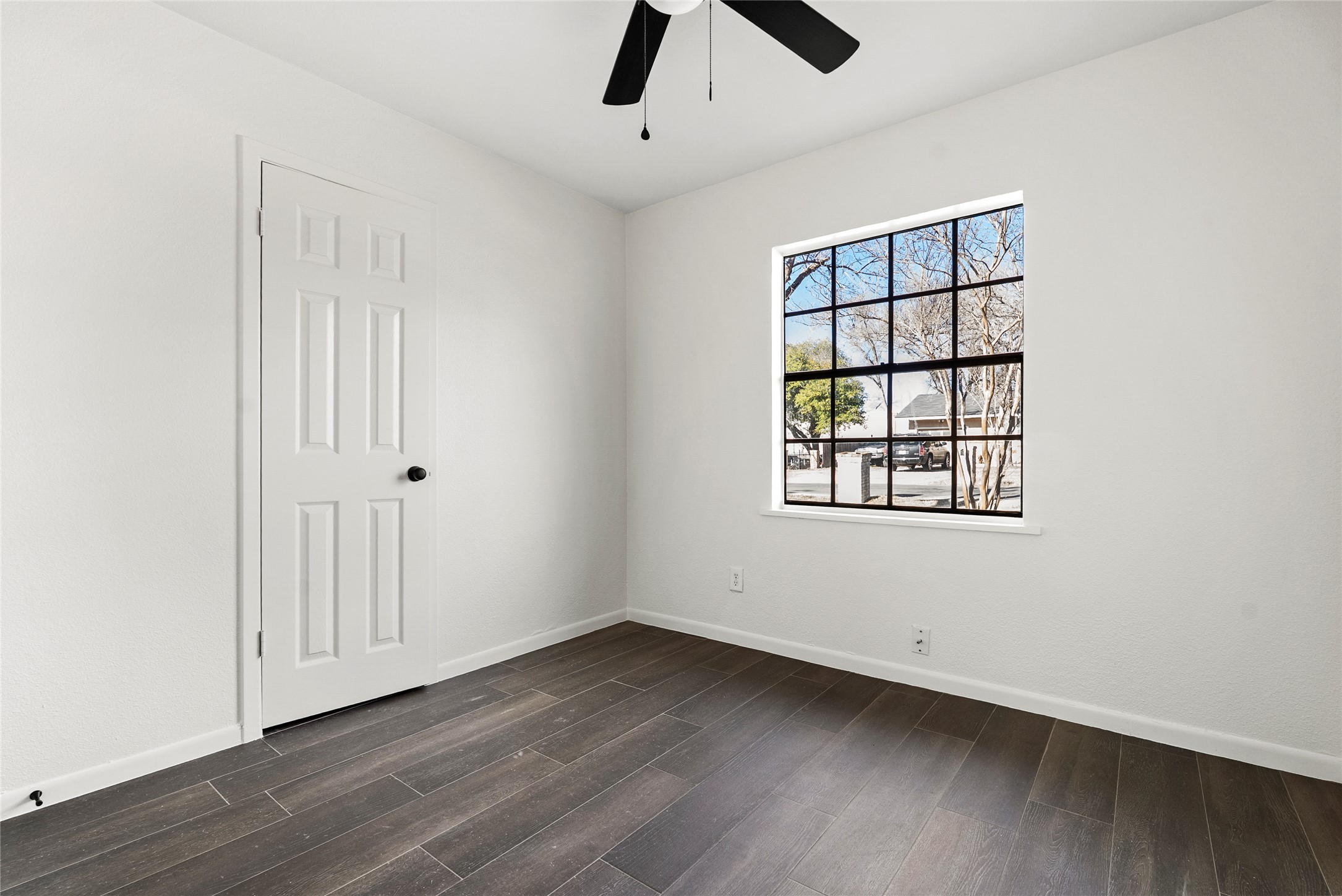 616 Mogonye Lane Elgin, TX 78621 - Photo 11 of 26 Wood-style flooring, and a ceiling fan