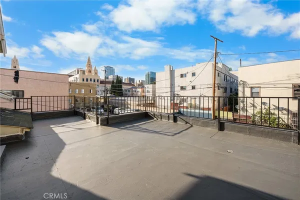 a view of a street with a garage