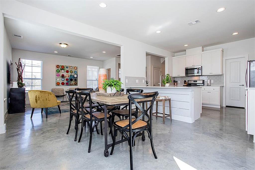 1311 Fort Branch Boulevard Austin, TX 78721 - Photo 15 of 27 Dining area featuring visible vents, recessed lighting, and concrete floors