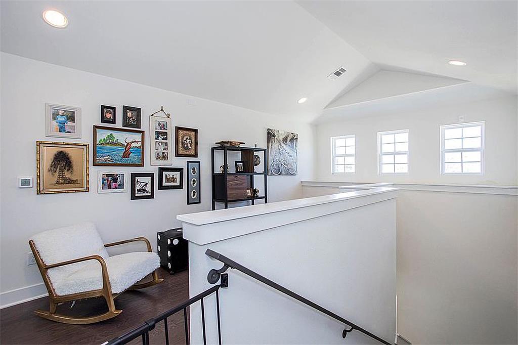 1311 Fort Branch Boulevard Austin, TX 78721 - Photo 21 of 27 Corridor featuring recessed lighting, visible vents, an upstairs landing, and lofted ceiling