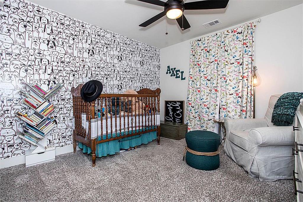 1311 Fort Branch Boulevard Austin, TX 78721 - Photo 23 of 27 Bedroom with carpet flooring and visible vents