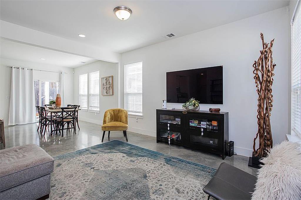 1311 Fort Branch Boulevard Austin, TX 78721 - Photo 6 of 27 Living room with recessed lighting, baseboards, visible vents, and concrete flooring