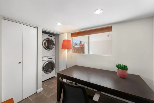 a workspace with a desk and chair