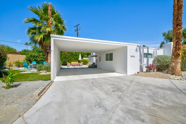 a view of a house with a street