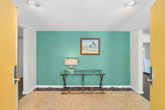 a view of a room with a window