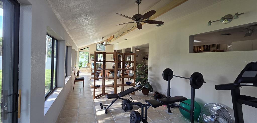 2076 River Basin Terrace Punta Gorda, FL 33982 - Photo 11 of 38 a view of a livingroom with furniture and a window