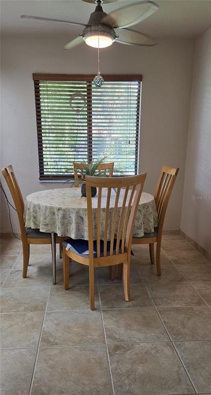 2076 River Basin Terrace Punta Gorda, FL 33982 - Photo 14 of 38 a view of a dining room with furniture
