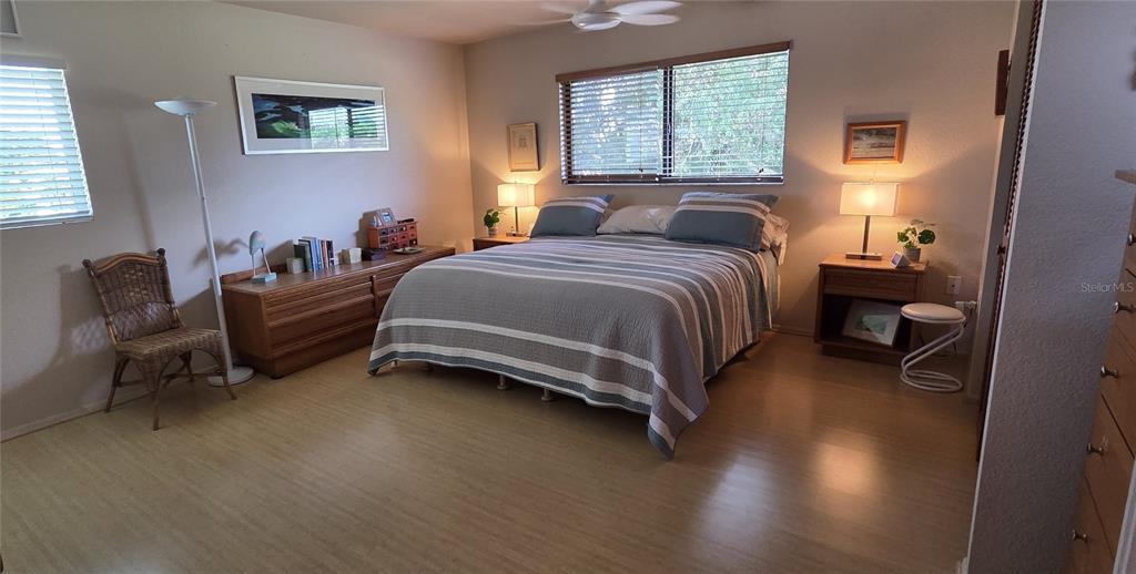 2076 River Basin Terrace Punta Gorda, FL 33982 - Photo 20 of 38 a bedroom with a bed and a couch