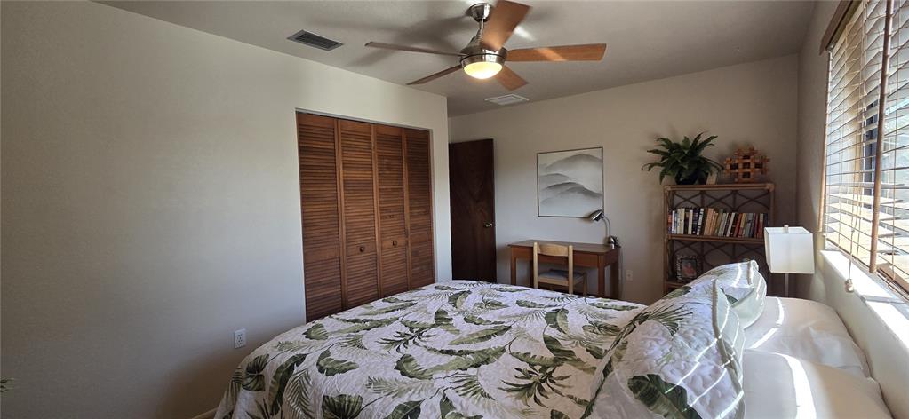 2076 River Basin Terrace Punta Gorda, FL 33982 - Photo 27 of 38 a bedroom with a bed dresser and a window
