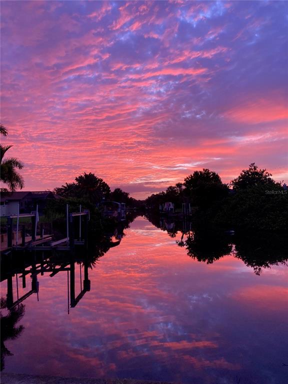 2076 River Basin Terrace Punta Gorda, FL 33982 - Photo 38 of 38 a view of lake with sunset