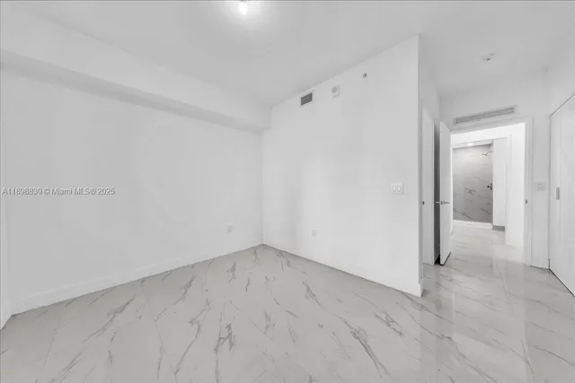 a view of bathroom with bathtub and shower