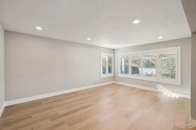 a view of an empty room with a window