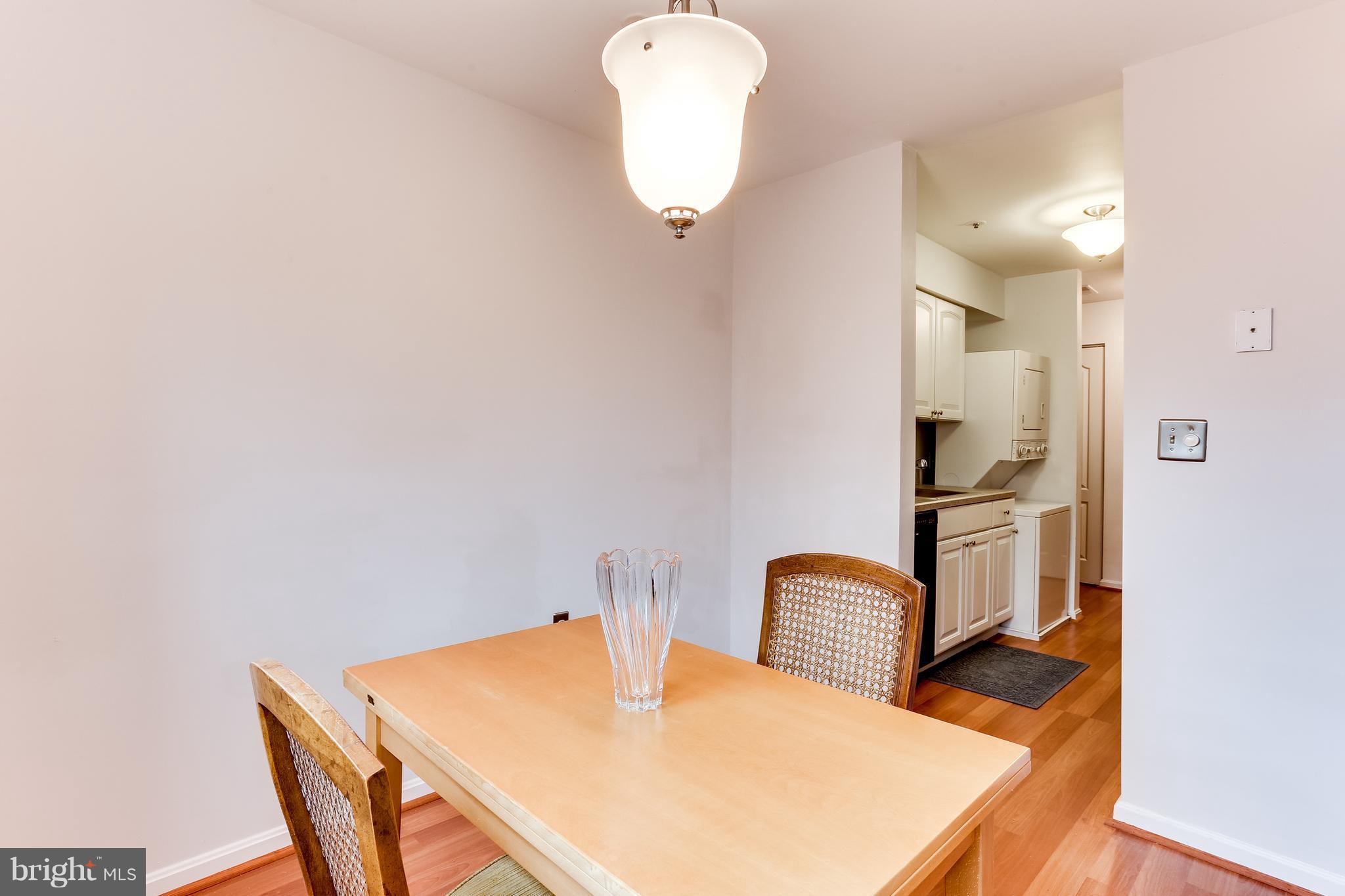 8513 Falls Run Road, Unit J Ellicott City, MD 21043 - Photo 11 of 30 Dining Room- Easy Access From Kitchen