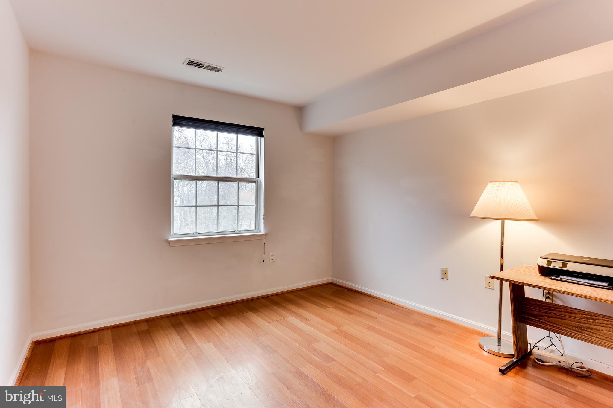 8513 Falls Run Road, Unit J Ellicott City, MD 21043 - Photo 23 of 30 Bedroom #2- Wood Laminate