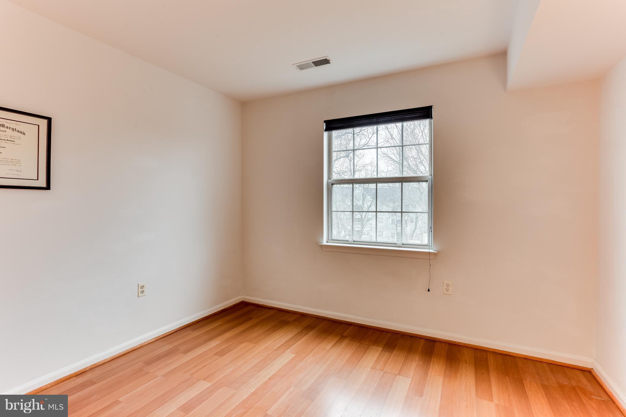 8513 Falls Run Road, Unit J Ellicott City, MD 21043 - Photo 26 of 30 Bedroom #2- View of Woods