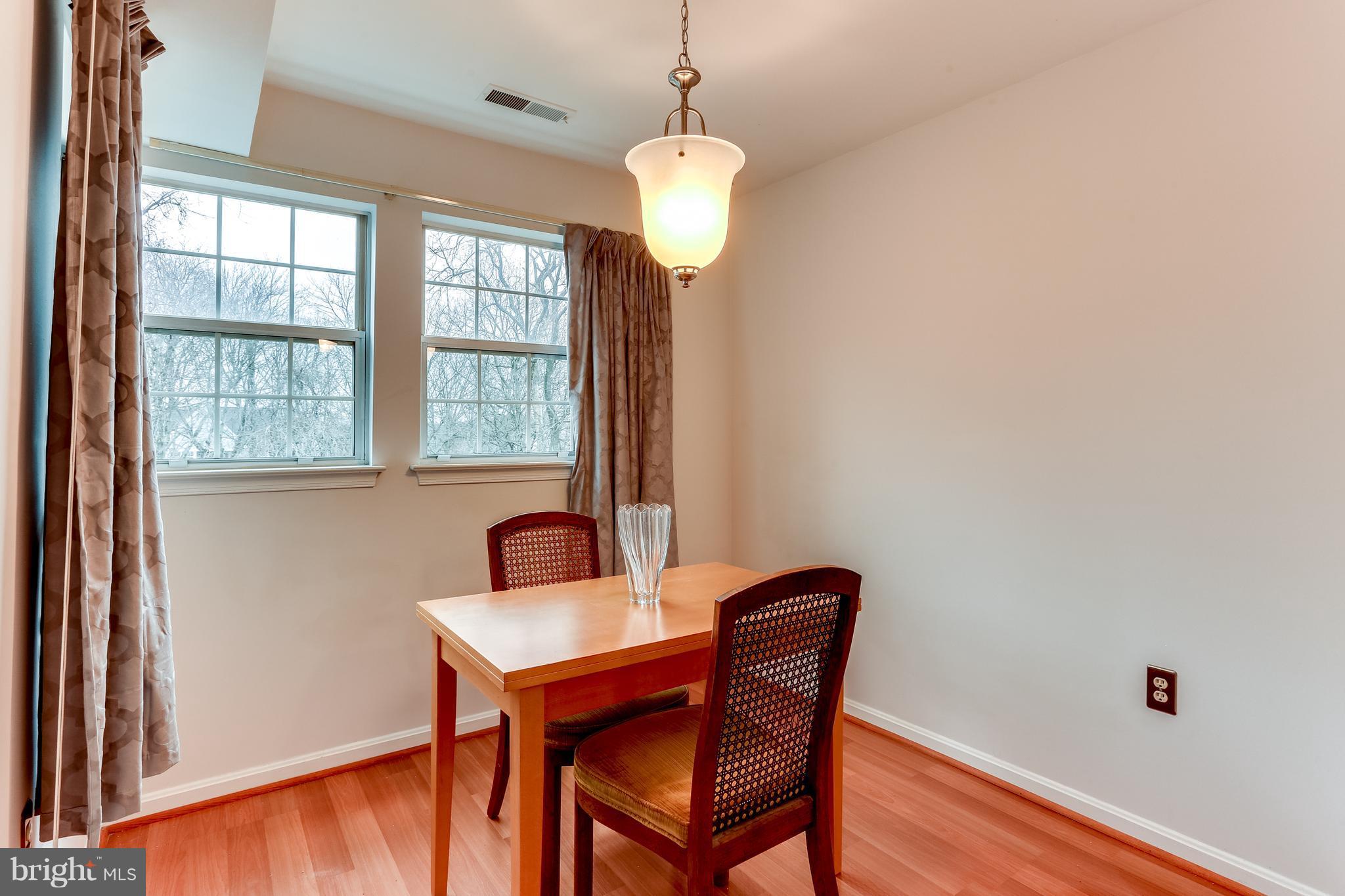 8513 Falls Run Road, Unit J Ellicott City, MD 21043 - Photo 9 of 30 Dining Room- Wood Laminate Flooring