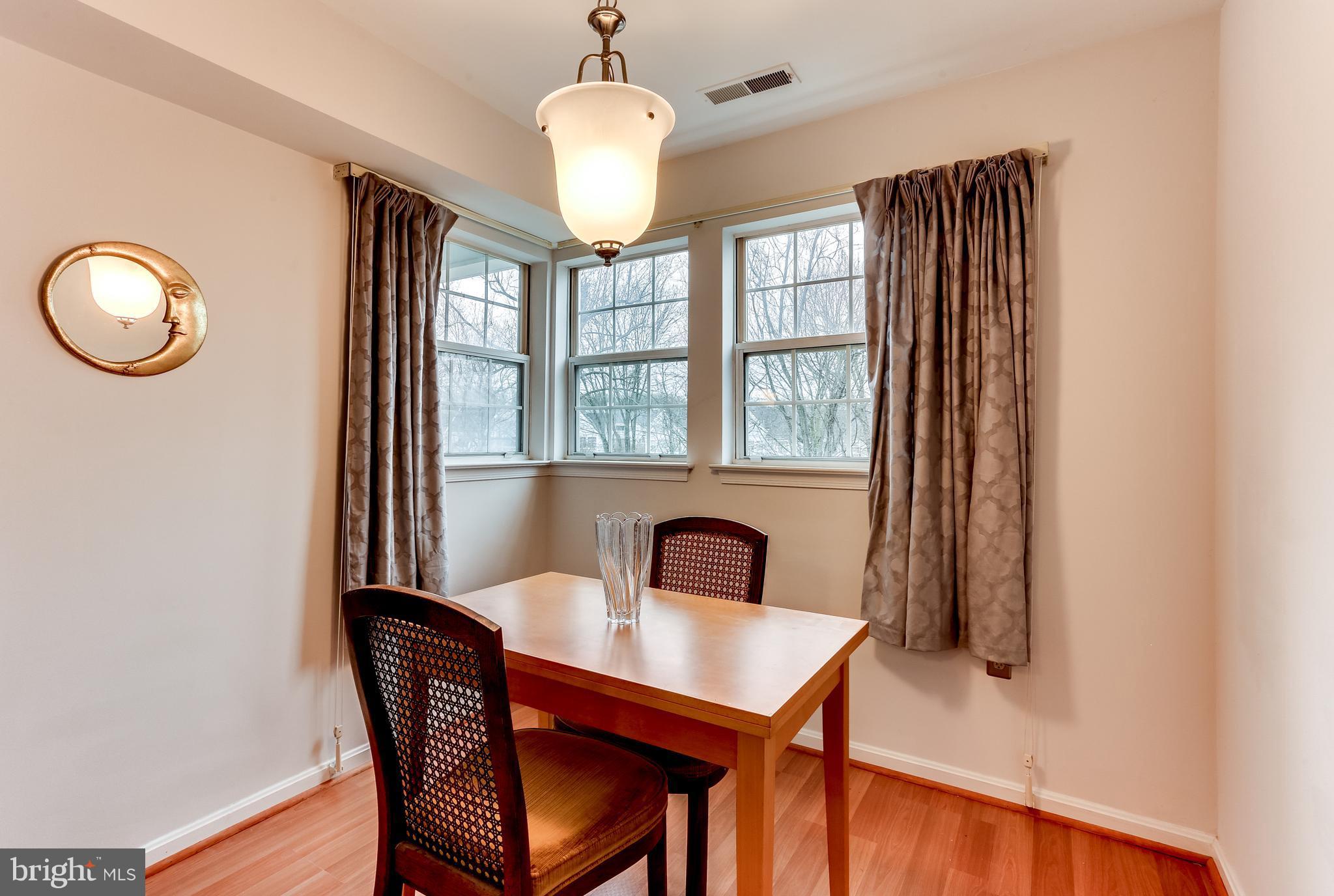 8513 Falls Run Road, Unit J Ellicott City, MD 21043 - Photo 10 of 30 Dining Room- Faces Quiet Wooded Area