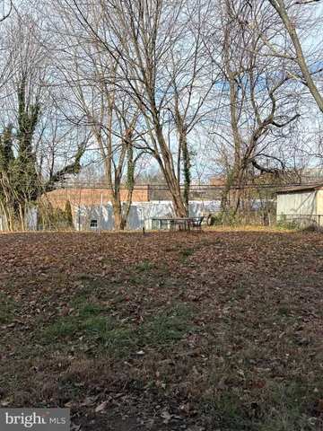 a view of yard covered with snow