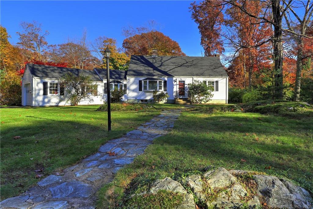 845 Hillcrest Road Orange, CT 06477 - Photo 1 of 1 a view of a house with a big yard