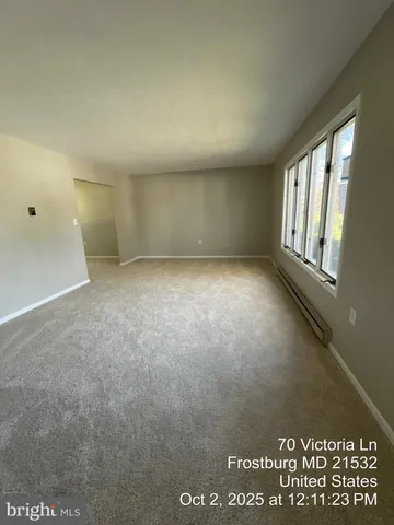 a bathroom with a sink toilet and mirror