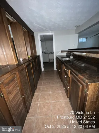 a view of a hallway with seating area