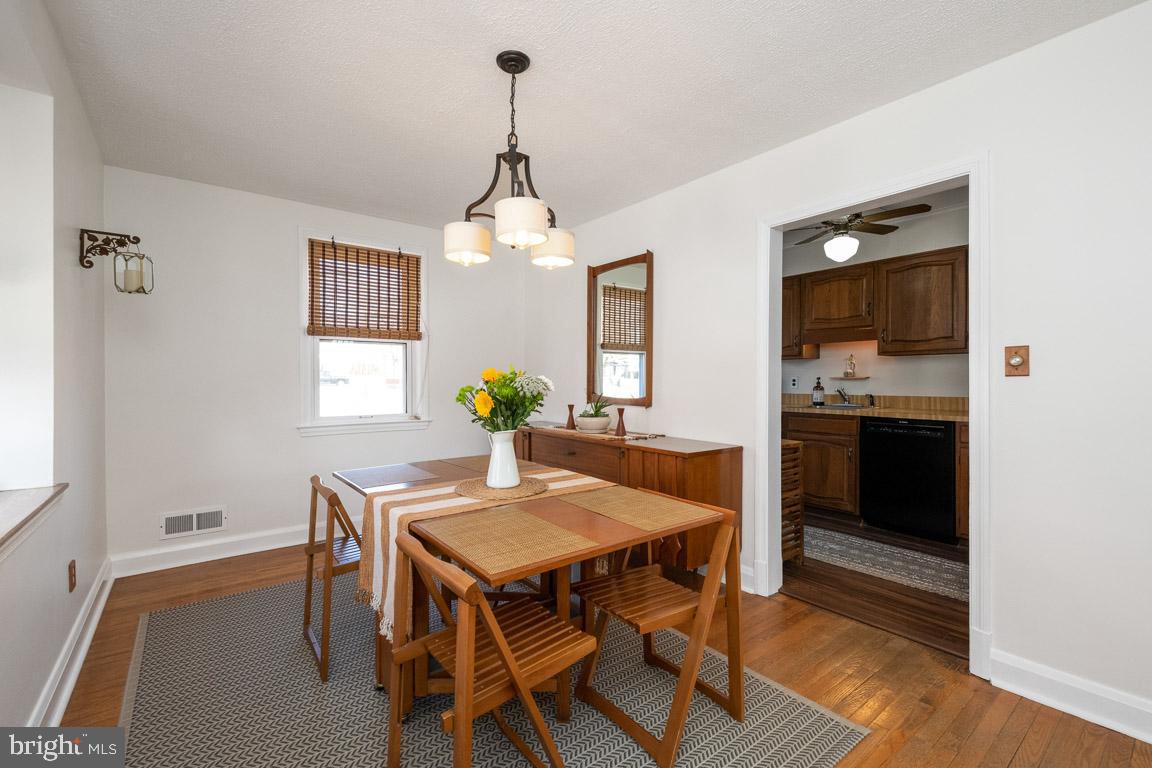 1600 Hardwick Road Towson, MD 21286 - Photo 10 of 34 Dining room with updated lighting and wood floors