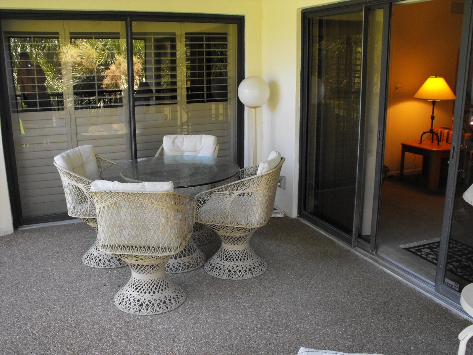 404 Clubhouse Circle Jupiter, FL 33477 - Photo 15 of 26 a view of a dining room with furniture wooden floor and chandelier