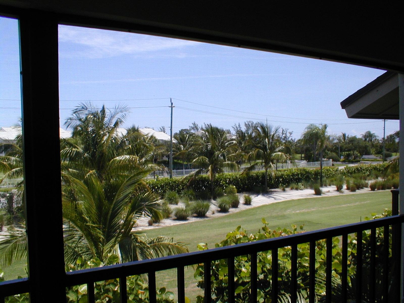 404 Clubhouse Circle Jupiter, FL 33477 - Photo 2 of 26 a view of a balcony with an outdoor space and seating