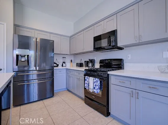 a view of a dining room with furniture and window