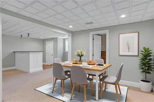 a view of empty room with window and ceiling fan