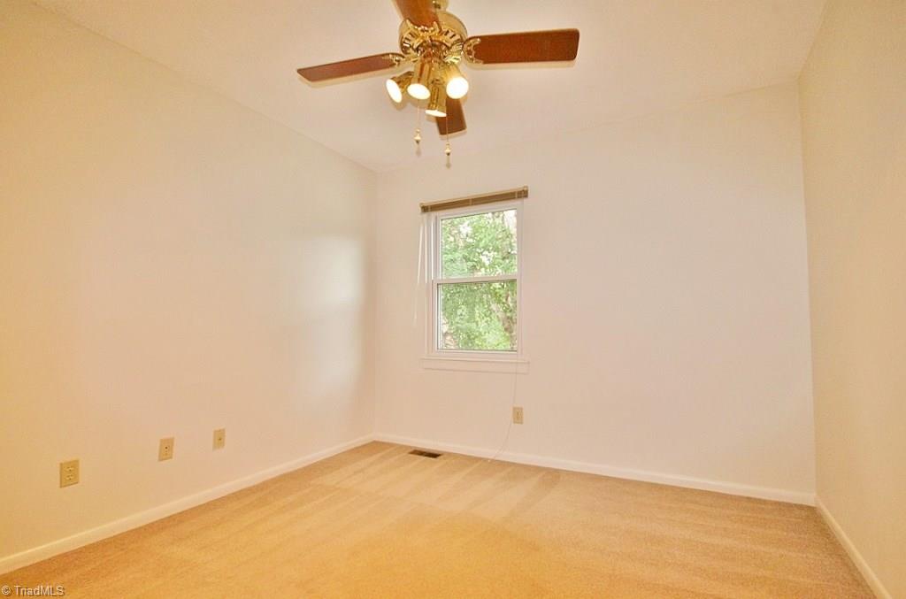 5725 Bramblegate Road, Unit A Greensboro, NC 27409 - Photo 16 of 28 Guest Bedroom (Bedroom 3 in listing), also has a ceiling fan & nice-size closet...