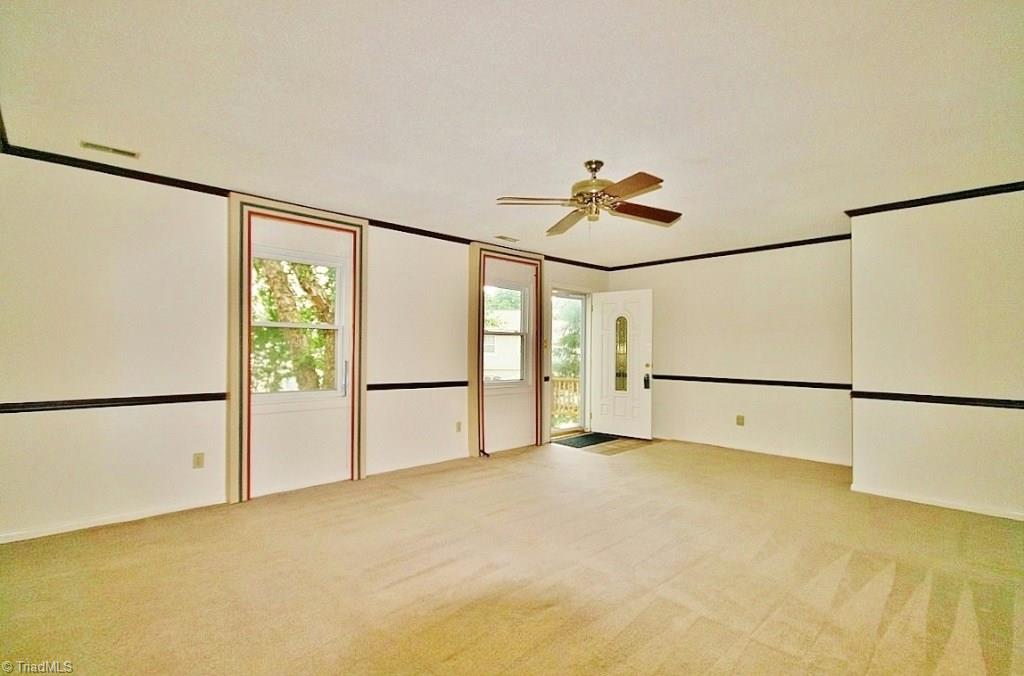 5725 Bramblegate Road, Unit A Greensboro, NC 27409 - Photo 3 of 28 Tons of natural lighting! View facing the front of the house...