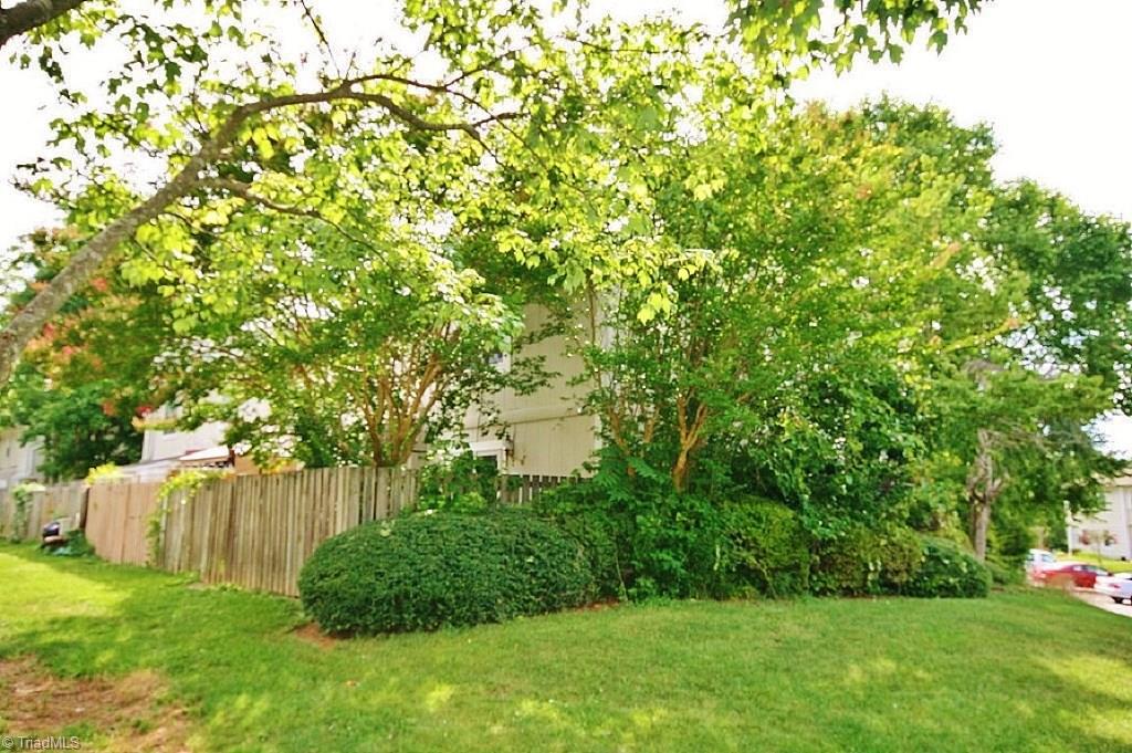 5725 Bramblegate Road, Unit A Greensboro, NC 27409 - Photo 21 of 28 Rear & Side view of End Unit Condo...