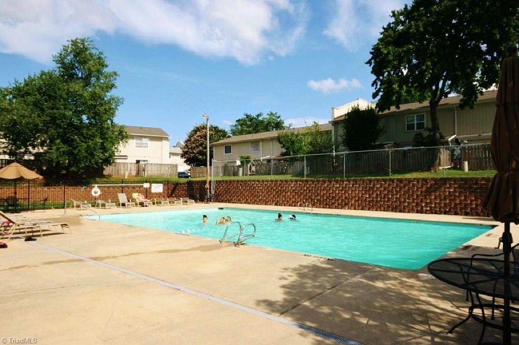 5725 Bramblegate Road, Unit A Greensboro, NC 27409 - Photo 22 of 28 Neighborhood Swimming Pool is right around the corner from this unit!!