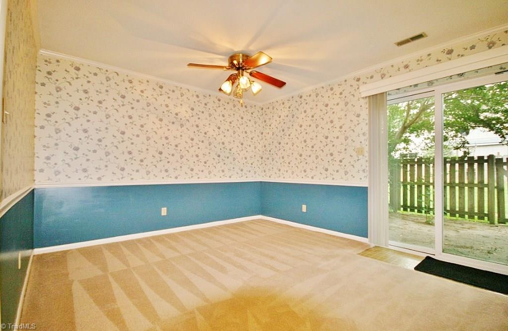 5725 Bramblegate Road, Unit A Greensboro, NC 27409 - Photo 8 of 28 Dining Room with Champion energy efficient sliding glass door leading out to back patio...