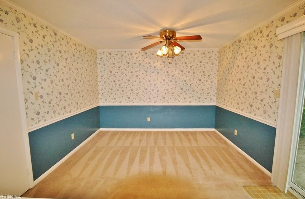 5725 Bramblegate Road, Unit A Greensboro, NC 27409 - Photo 9 of 28 Dining Room view from the Breakfast Bar with Utility/Laundry Room to the left & back Patio to the right...