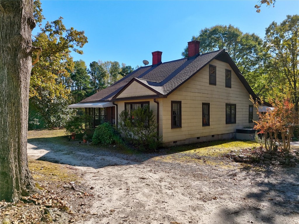 0 Cromer Road, Unit 245 CROMER ROAD Williamston, SC 29697 - Photo 14 of 24 This charming residence offers comfortable living in a serene setting, surrounded by mature trees.