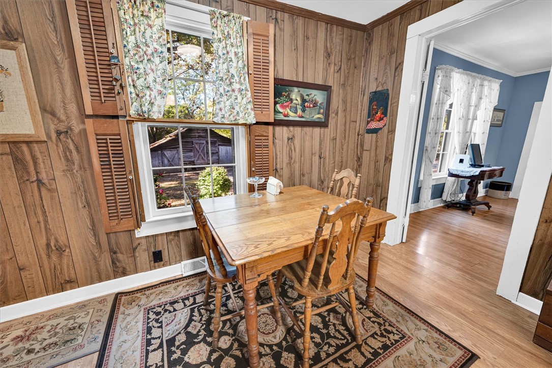0 Cromer Road, Unit 245 CROMER ROAD Williamston, SC 29697 - Photo 19 of 24 This cozy dining area features warm wood paneling and views of the surrounding property.