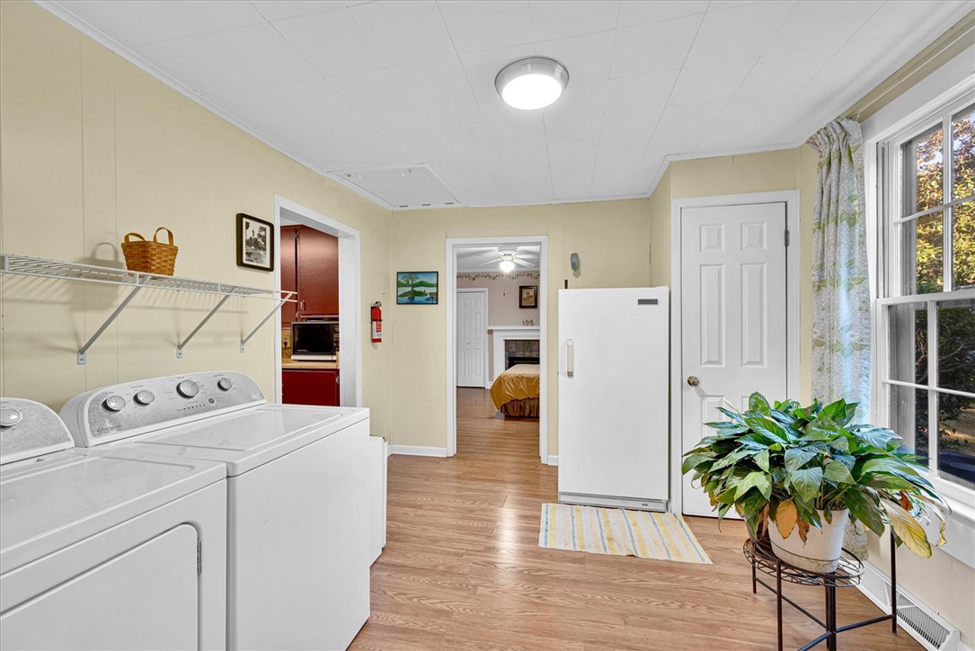 0 Cromer Road, Unit 245 CROMER ROAD Williamston, SC 29697 - Photo 21 of 24 This functional utility space features essential appliances and durable flooring.