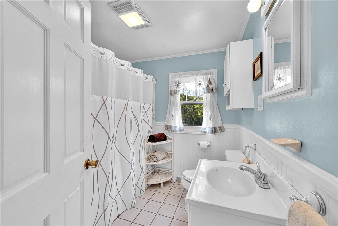 0 Cromer Road, Unit 245 CROMER ROAD Williamston, SC 29697 - Photo 23 of 24 Bright and functional bathroom with clean tile flooring and natural light.