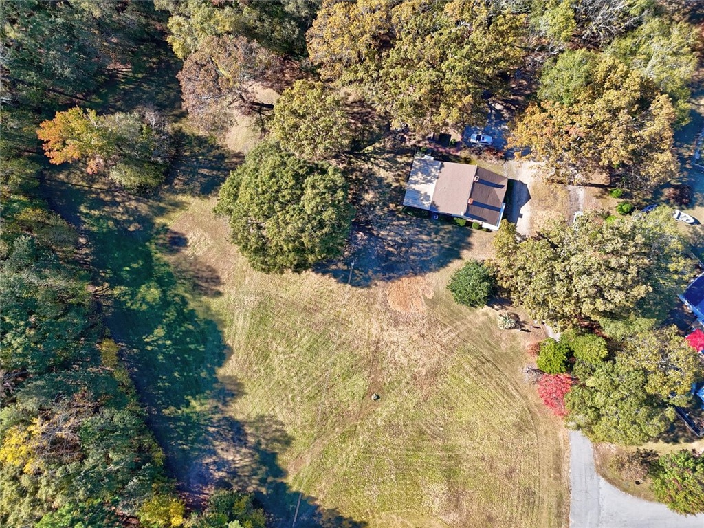 0 Cromer Road, Unit 245 CROMER ROAD Williamston, SC 29697 - Photo 4 of 24 This expansive lot with a charming home offers a tranquil retreat amidst lush natural surroundings.